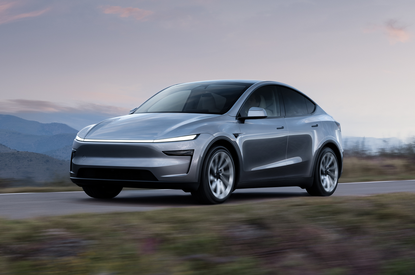 Tesla Model Y 7-Seater front driving