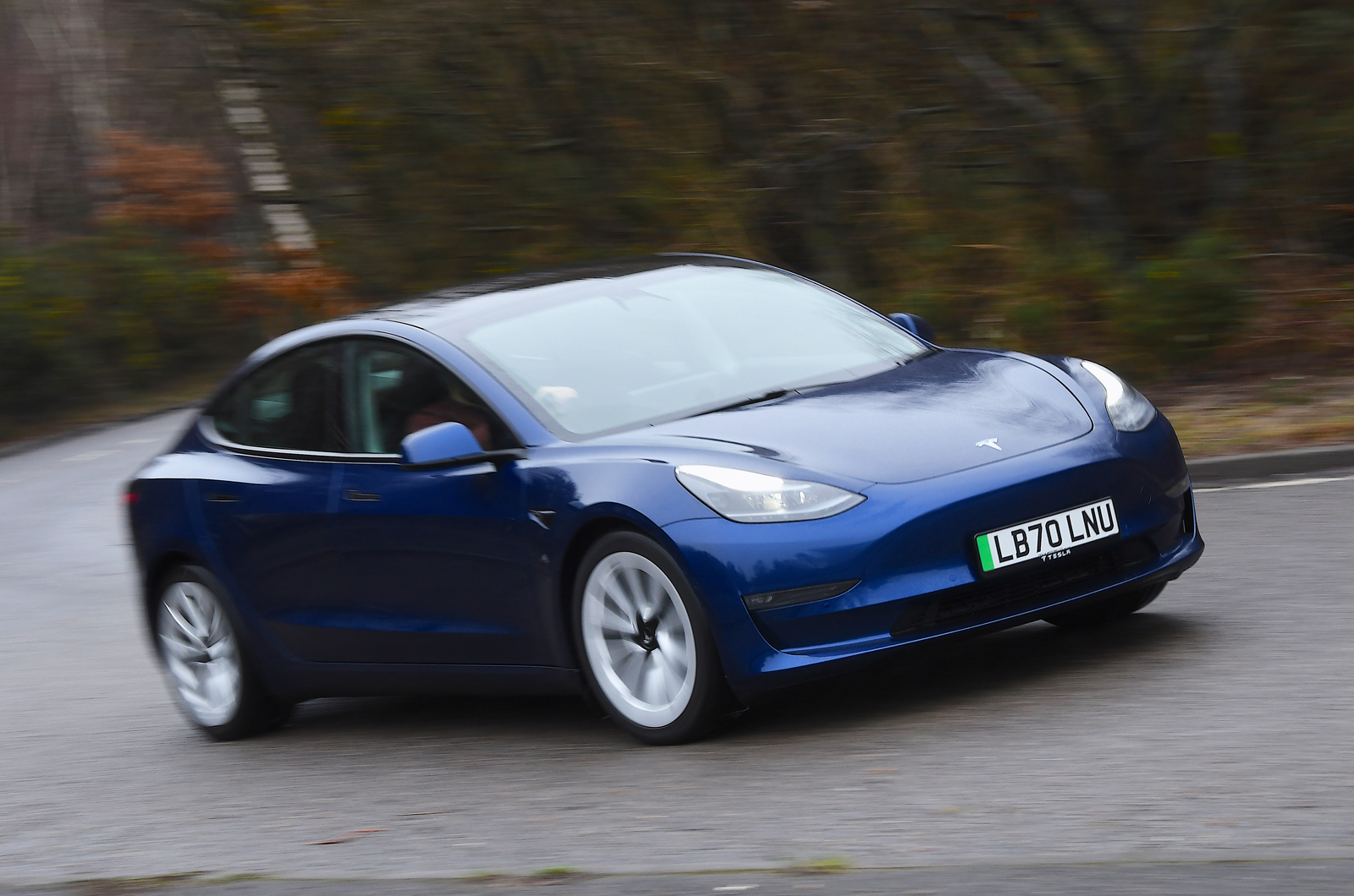 Tesla Model 3 electric executive car front cornering