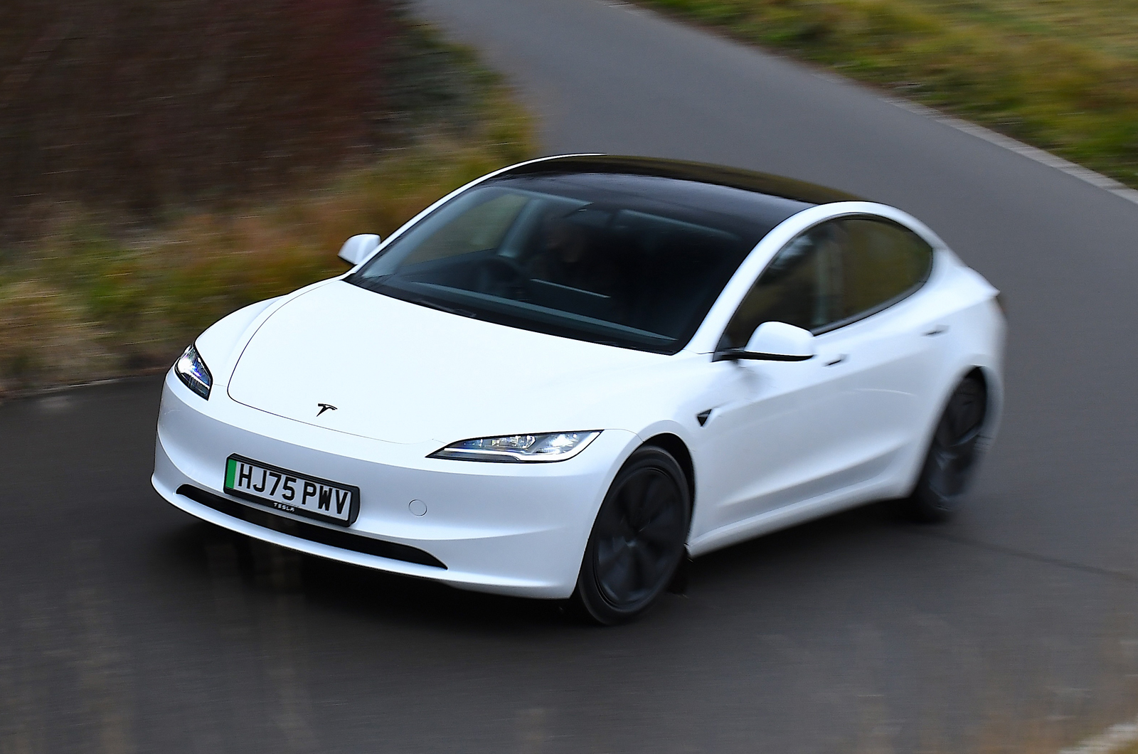 Tesla Model 3 front driving 