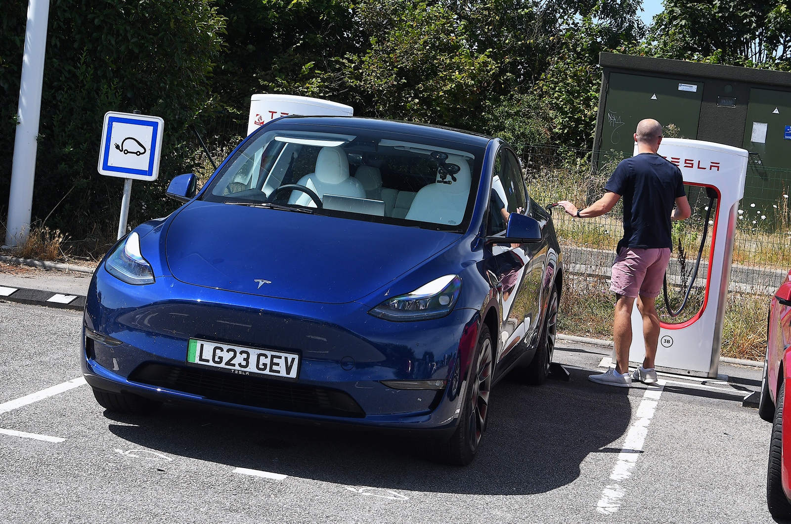 Tesla Model Y charging at Supercharger