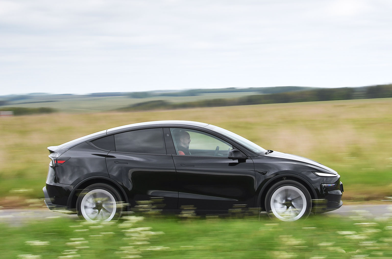 Tesla Model Y side driving