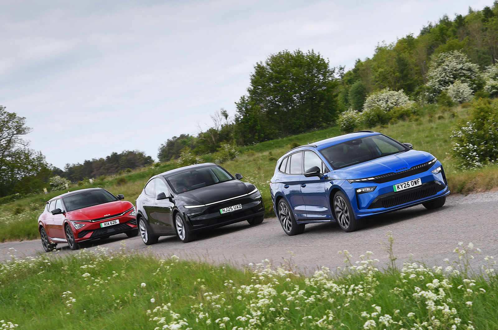 Tesla Model Y vs Skoda Enyaq vs Kia EV6 fronts driving