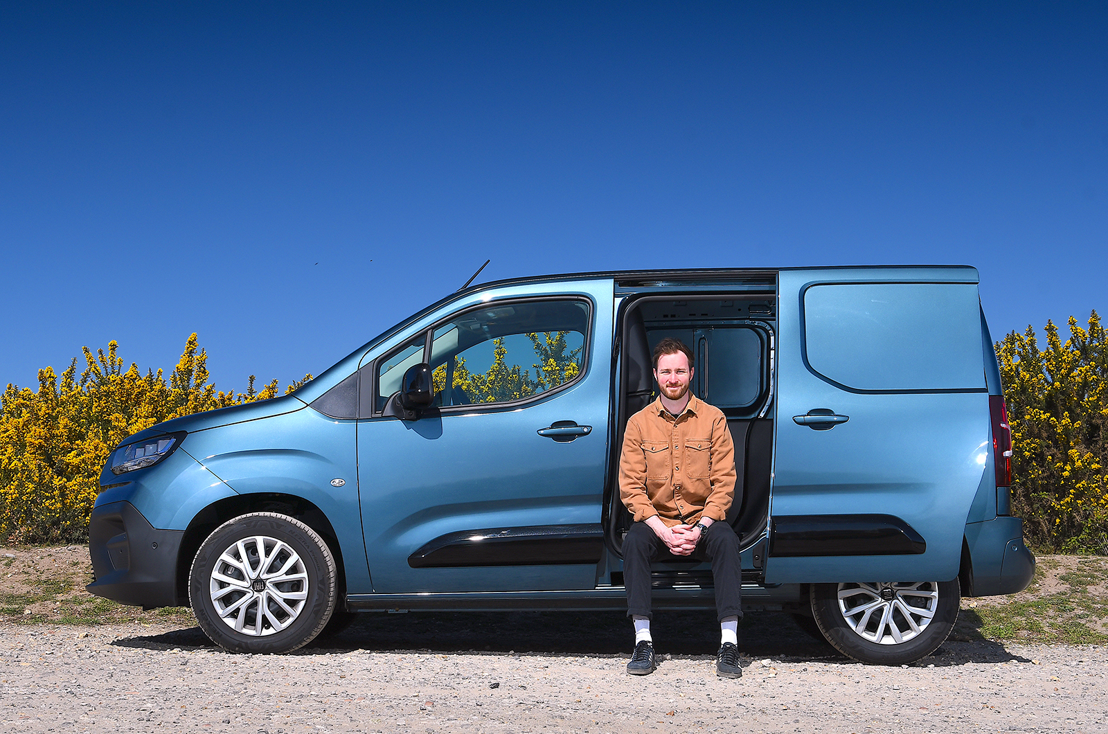 Tom sitting inside his Fiat Doblo Storage area 