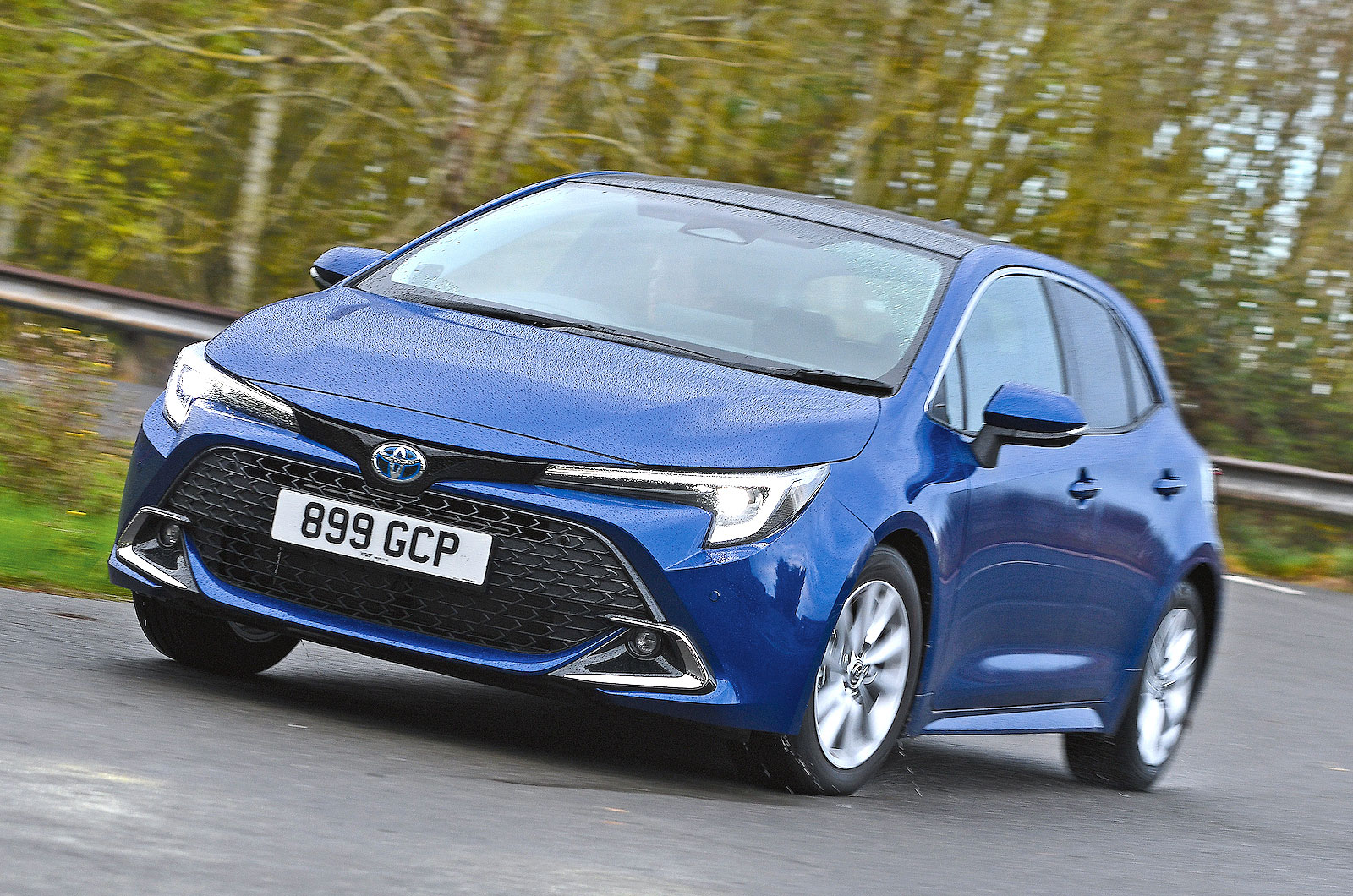Blue Toyota Corolla front cornering