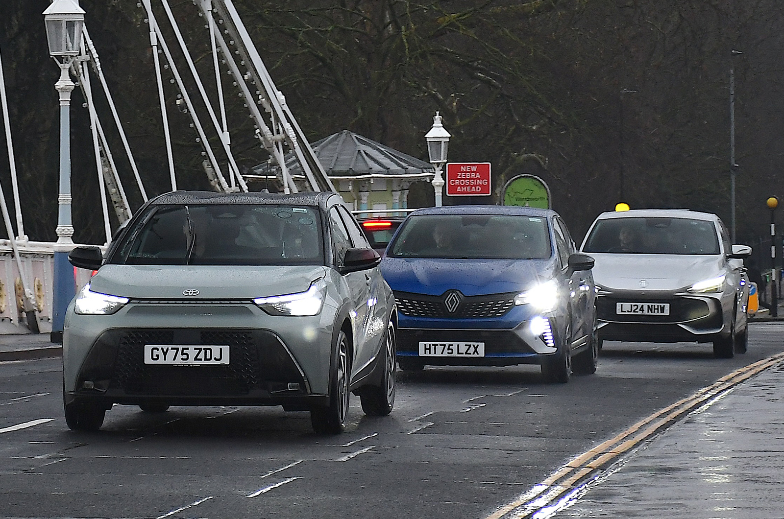 Toyota Aygo X driving in front of MG3 and Renault Clio