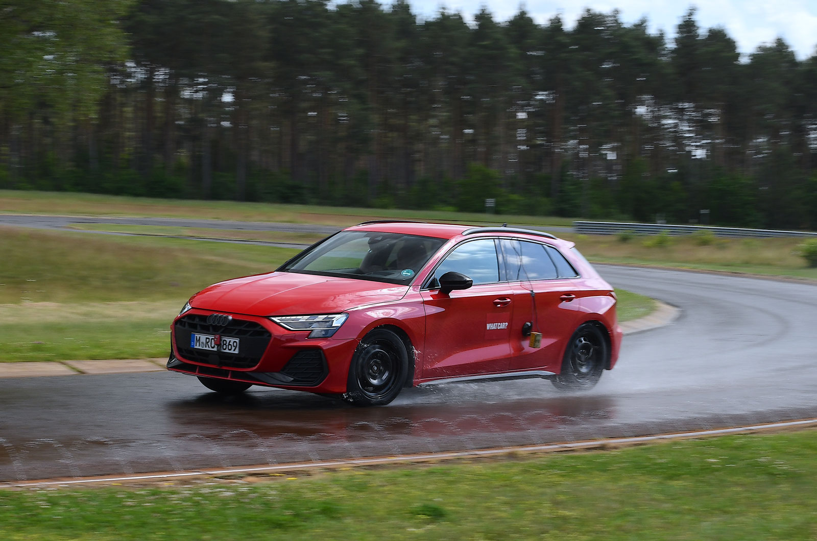 audi-a3-on-wet-handling-track-side