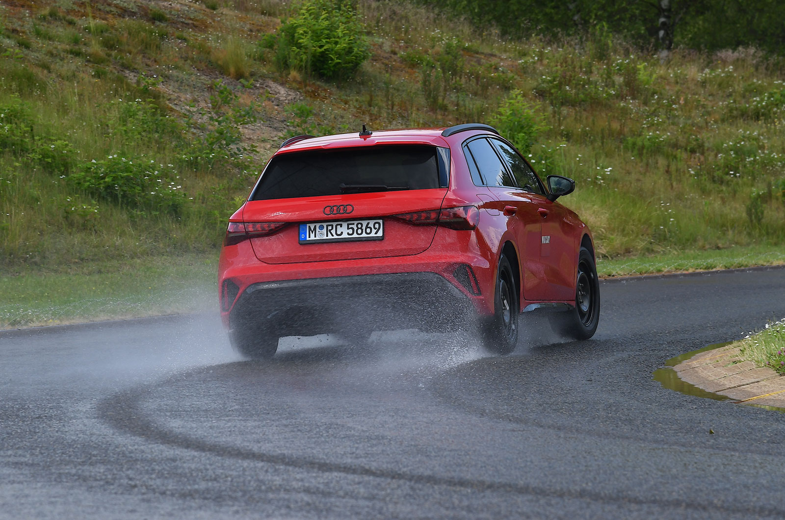 audi-a3-on-wet-handling-track-rear
