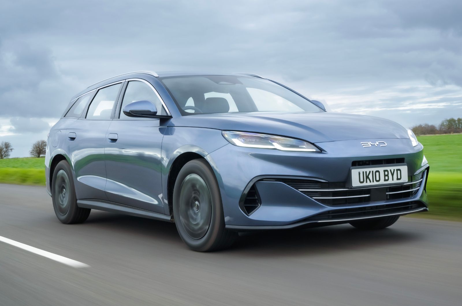 Blue BYD Seal 6 Touring tracking right