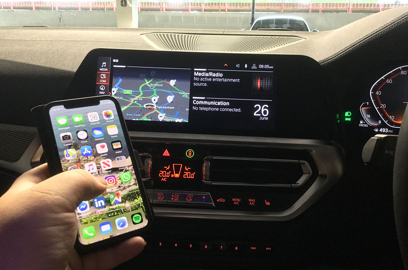 Used BMW 3 Series interior with mobile phone