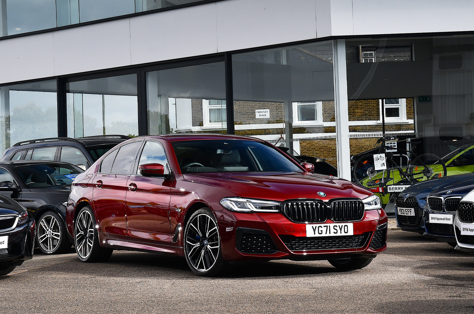 BMW 5 Series on forecourt