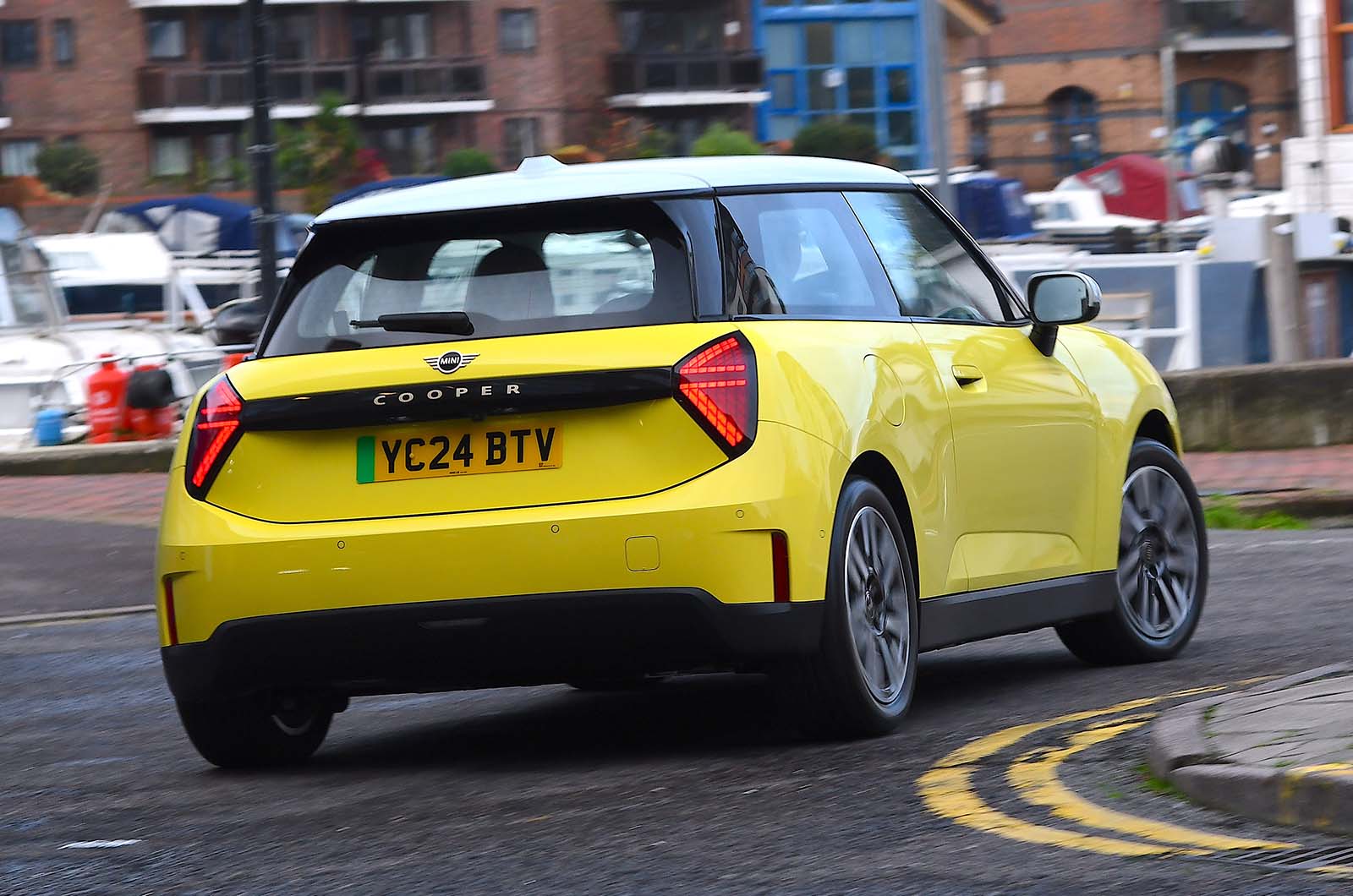 Used Mini Cooper Electric 2024-present rear cornering yellow