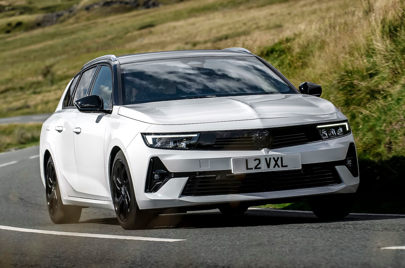 White Vauxhall Astra Sports Tourer front cornering