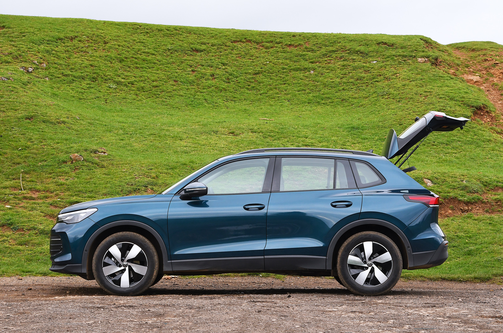 Volkswagen Tiguan side with boot open blue