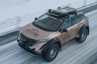 Modified Nissan ARIYA front three quarters on the road