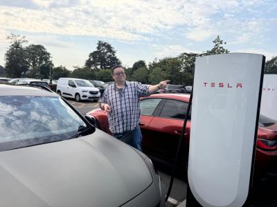 Cupra Formentor plugging into Tesla charger