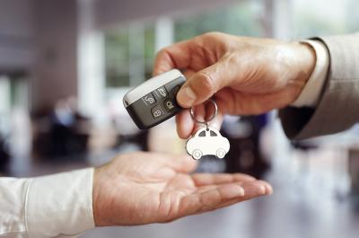 Car keys being handed over