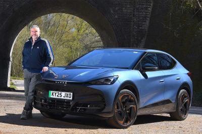 Allan Muir next to Cupra Tavascan