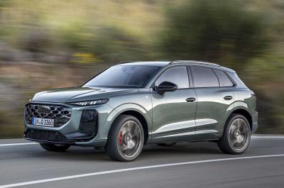 Audi Q3 driving front three quarters