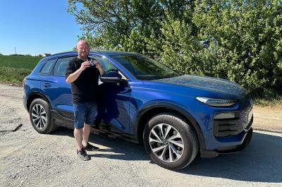 Audi Q6 e-tron blue front side