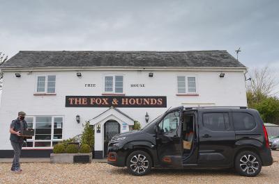 Citroen Berlingo in front of pub