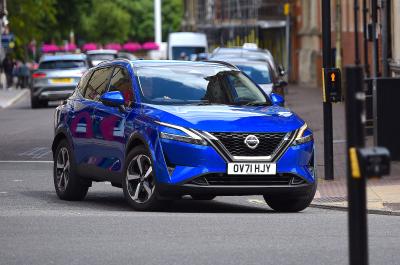 Blue Nissan Qashqai front cornering