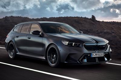 BMW M5 Touring estate front driving