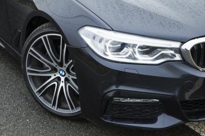 BMW 5 Series alloy wheel and headlight
