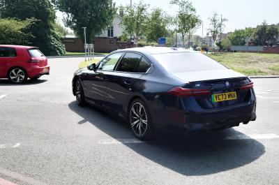 BMW i5 LT pulling out of junction