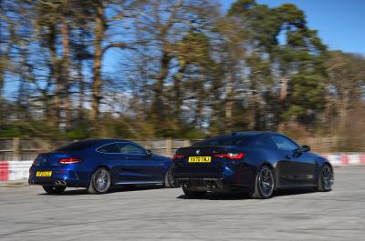 BMW M4 vs Mercedes-AMG C63 S Coupe rears