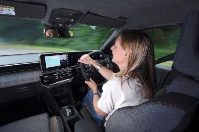Claire Evans driving Renault 5