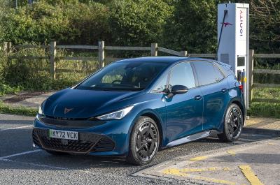 Dark blue Cupra Born charging