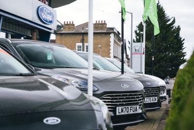 Ford dealership with cars on forecourt