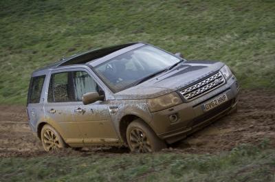 Land Rover Freelander front 3/4 up muddy hill