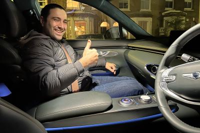 Genesis GV70 interior with person inside