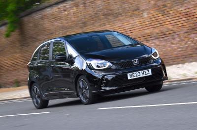 Black Honda Jazz front right driving