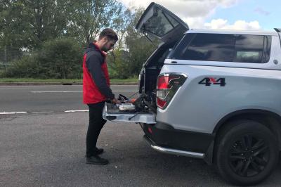 Using the Ssangyong Musso split tailgate as an office desk