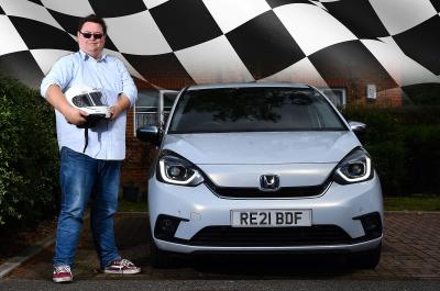 Honda Jazz with racing flag