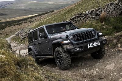 Jeep Wrangler climbing rocky path