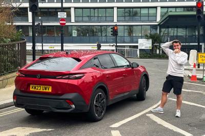 Jonty with Peugeot 408 at red light