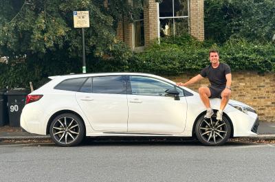 Jonty sitting on LT Toyota Corolla Touring Sports