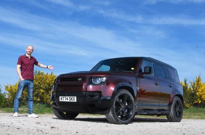 Land Rover Defender LT being gestured to