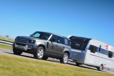 Land Rover Defender pulling a caravan