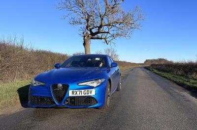 LT Alfa Romeo Giulia Veloce parked on a country road