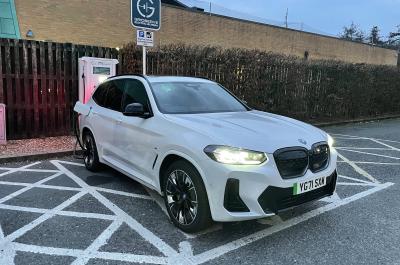LT BMW iX3 charging at motorway services
