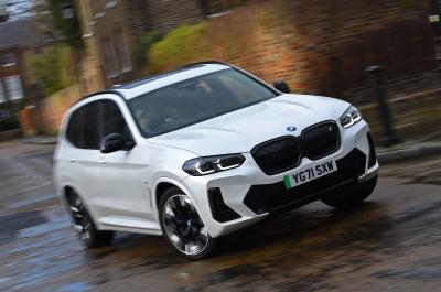 LT BMW iX3 cornering in town