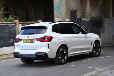 LT BMW iX3 rear - entering tunnel