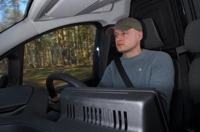 Max driving Renault Kangoo van