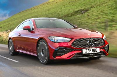 Red Mercedes CLE Coupé front right driving