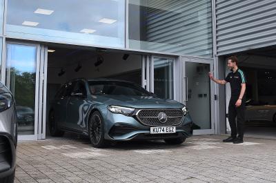 Mercedes E300de Estate front driving dealer handover