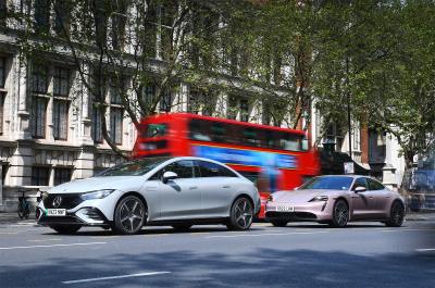 Mercedes EQE and Porsche Taycan with London bus